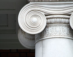 Photo of an ionic column. Link to Gifts That Protect Your Assets.