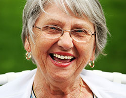 Photo of a woman smiling. Link to Life Stage Gift Planner Over Age 70 Situations.
