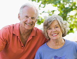 Photo of a couple smiling. Link to Life Stage Gift Planner Ages 60-70 Situations.